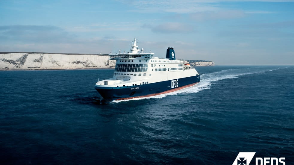 DFDS ferry sailing past Dover's cliffs